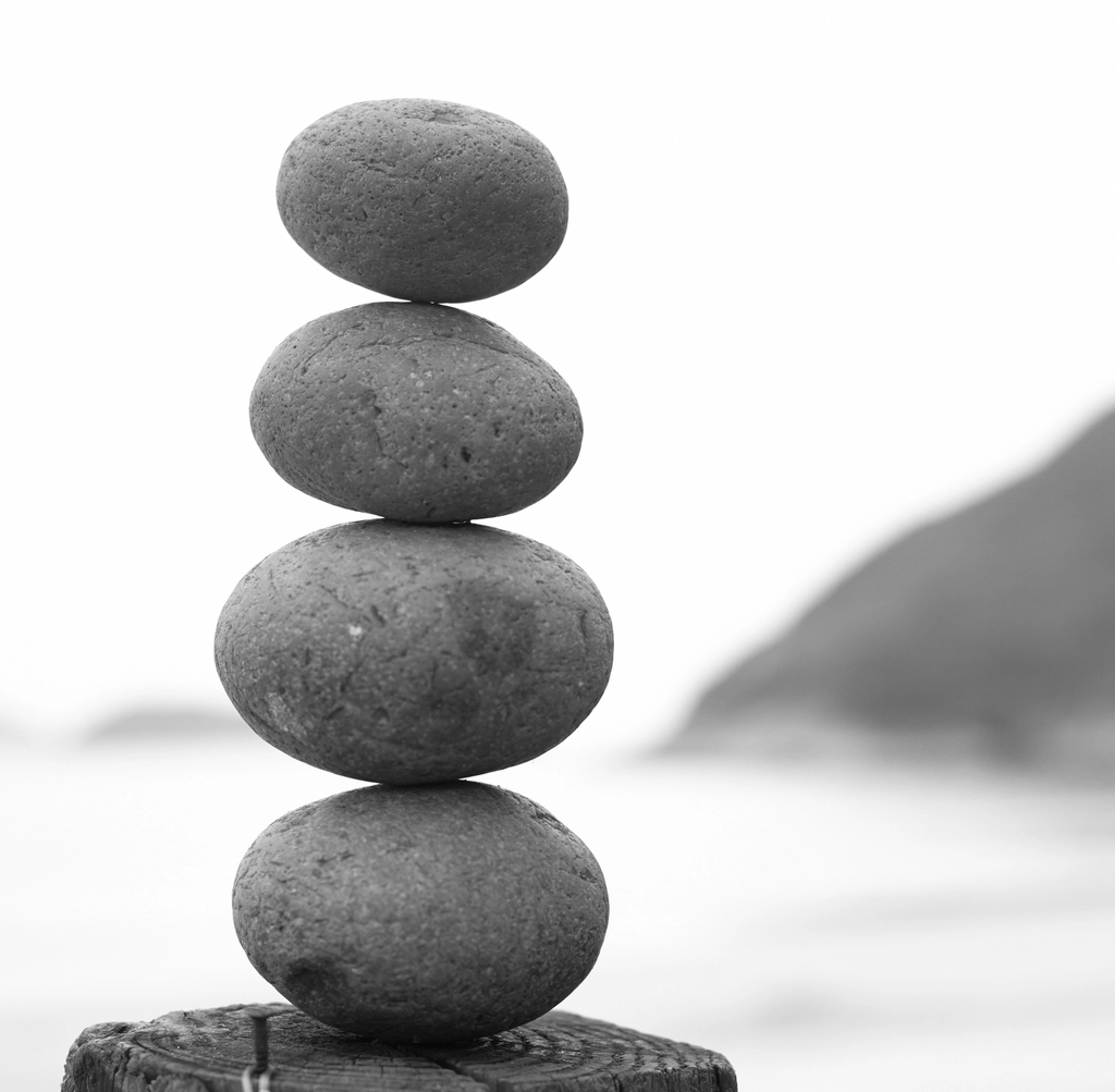 Balanced stones representing calm and wellness
