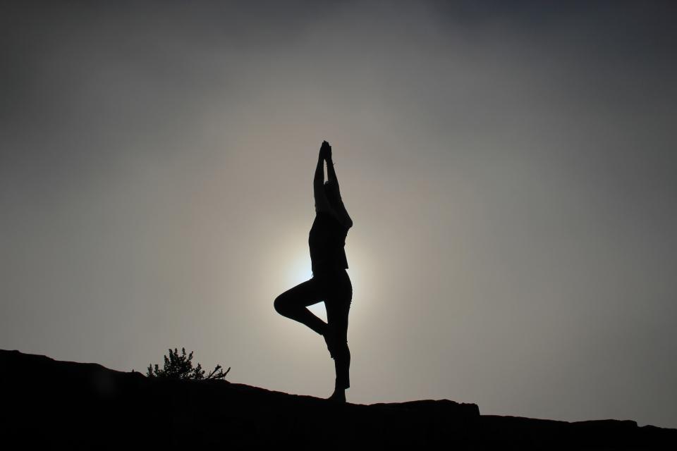 Tai chi and yoga practice outdoors